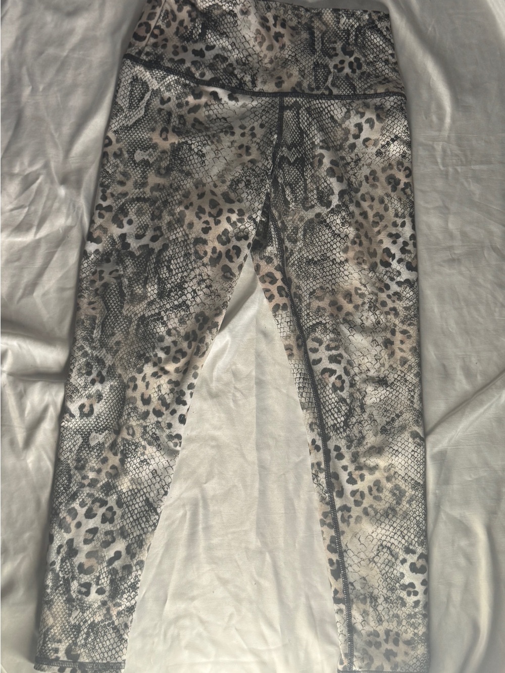 Evolution and Creation Beige and Black Snake-Print Leggings with Pink Logo